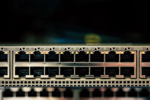 Detailed view of a network switch featuring multiple ethernet ports and LED indicators.